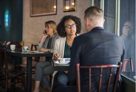 man-woman-meeting-table-coffee